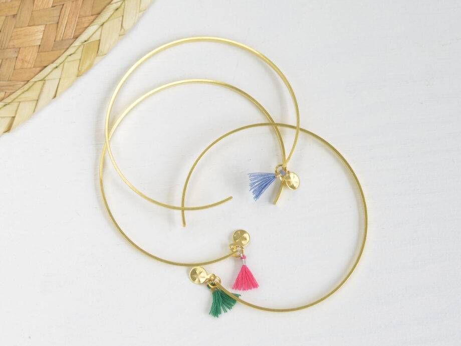 Renna Deluxe Armreif in Gold, Goldarmreif mit niedlicher Tassel im Boho-Stil Auslauf